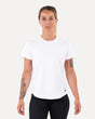 A woman wearing a white t-shirt with short sleeves, standing against a plain background.