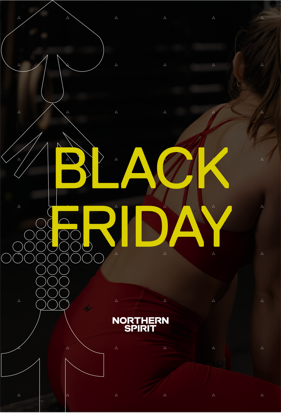 Female CrossFit® athlete wearing Northern Spirit red sports bra and leggings, training indoors during Black Friday campaign.