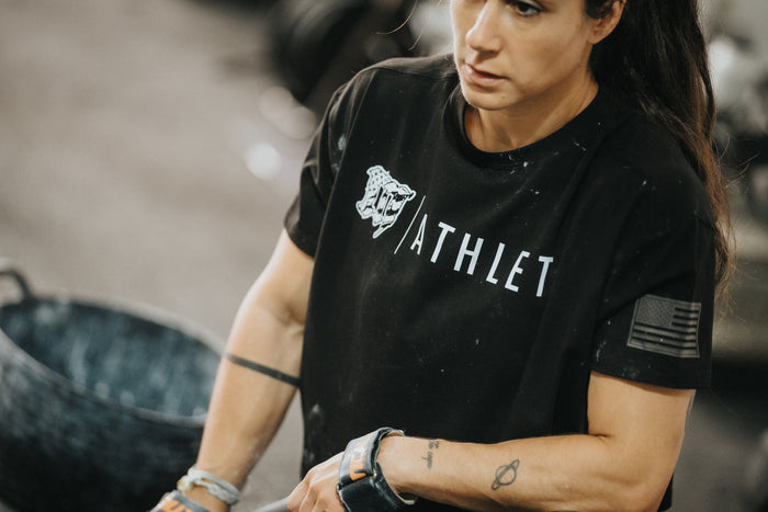 Athlete wearing a black Mayhem Athlete T-shirt during CrossFit training — premium performance apparel from the Northern Spirit x Mayhem collection.