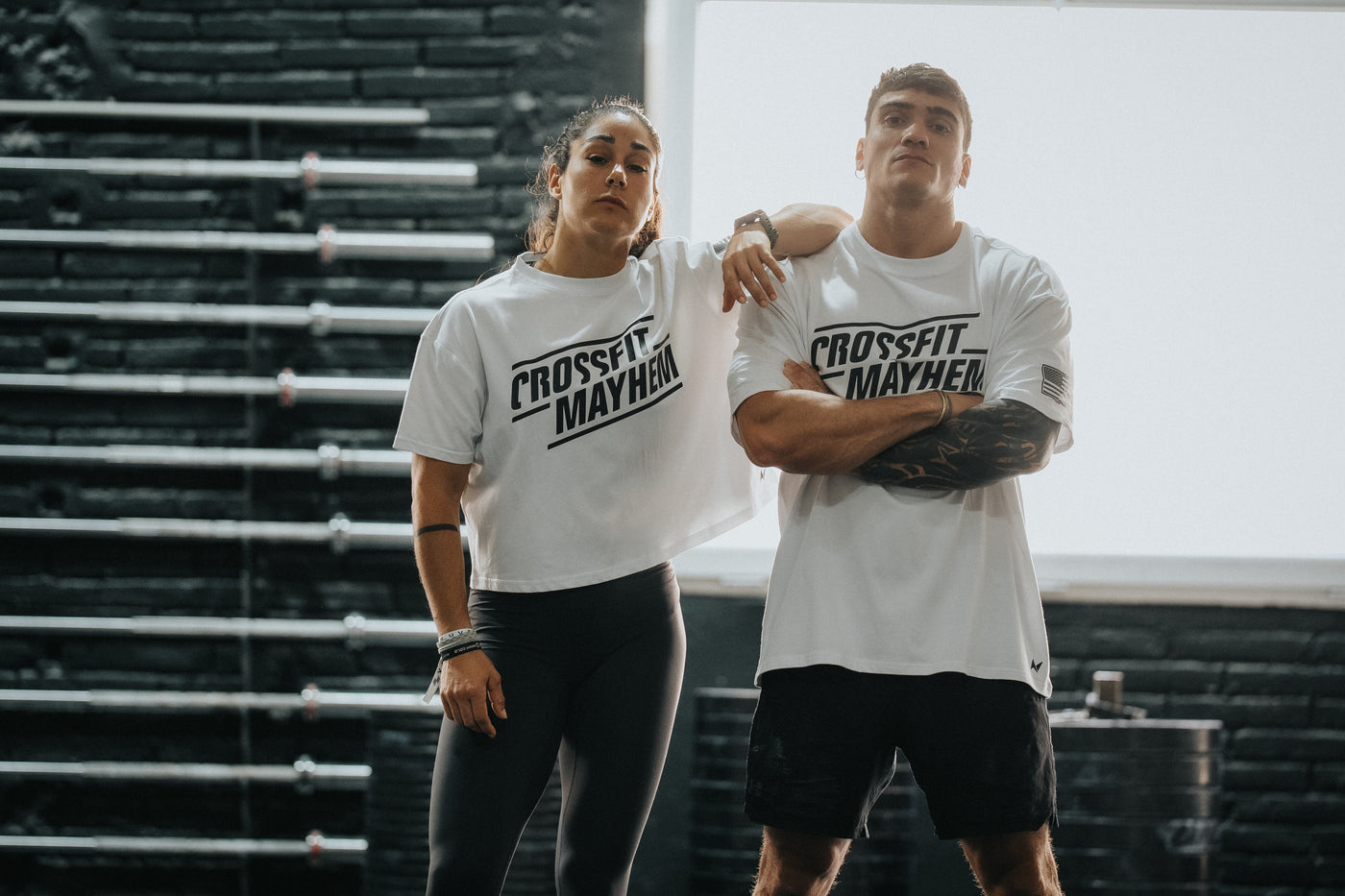 Athletes wearing CrossFit Mayhem x Northern Spirit T-shirts posing in a gym — showcasing premium CrossFit training apparel collaboration