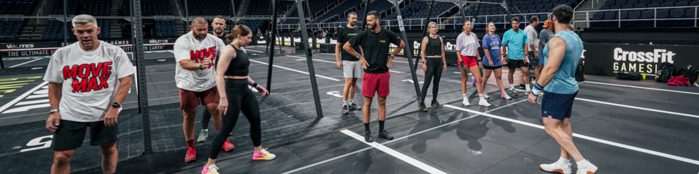 Group of people exercising a MoveMax session on a CrossFit branded court during the CF Games in Albany, New-York.
