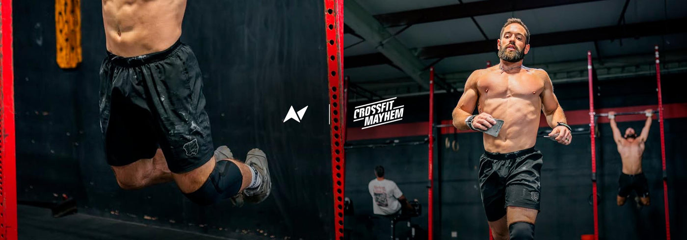 CrossFit® Athlete Rich Froning wearing Northern Spirit x Mayhem Grit Shorts performing workout in a functional fitness gym, promoting European launch.