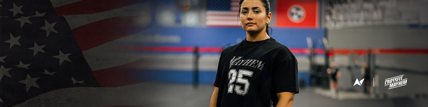 Crossfit women wearing Mayhem x Northern Spirit t-shirt in a gym