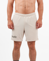Men’s beige CrossFit® 8-inch shorts with tone-on-tone logo, breathable adjustable fit ideal for training.