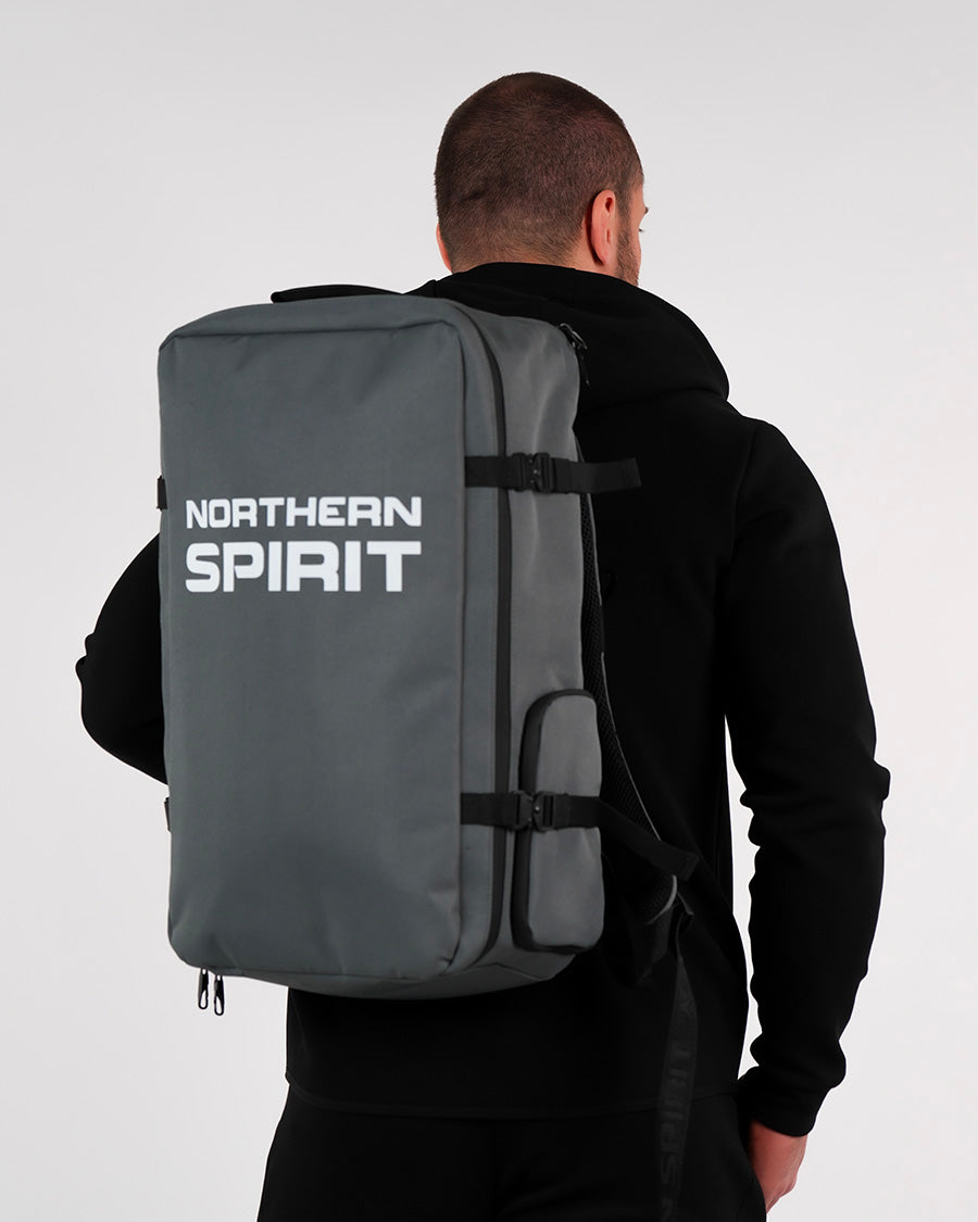 Northern Spirit N-Trek Backpack in Metal Stone grey – large waterproof training and travel bag with bold white logo, durable straps, and multiple compartments.