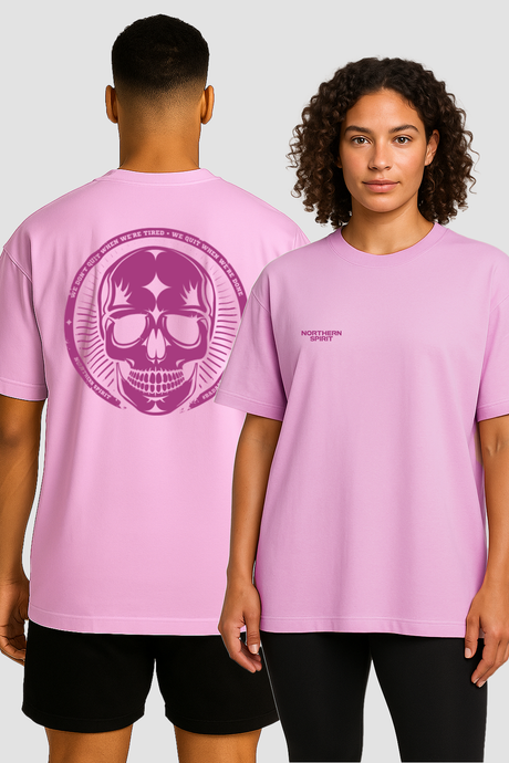 Two people wearing pink t-shirts with a skull design on a plain background