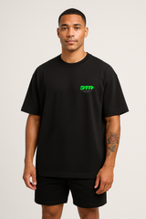 Male model wearing black oversized Save The Rep Algorithm T-shirt, STR neon green logo on chest, Northern Spirit apparel.